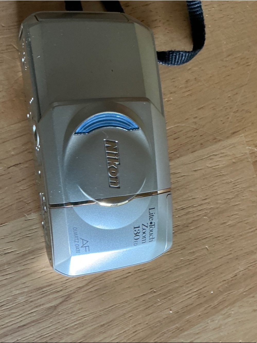 Nikon Silver Compact Digital Camera with Blue Accent